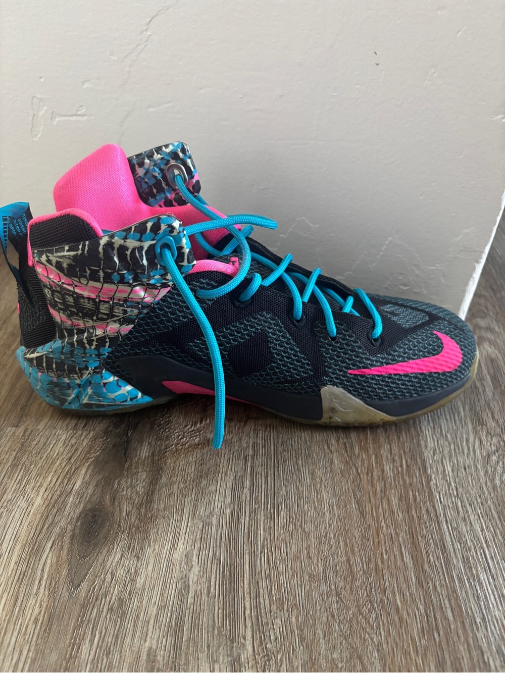 Nike Kids' Black & Teal High-Top Basketball Shoes with Pink Accents. LeBron shoe